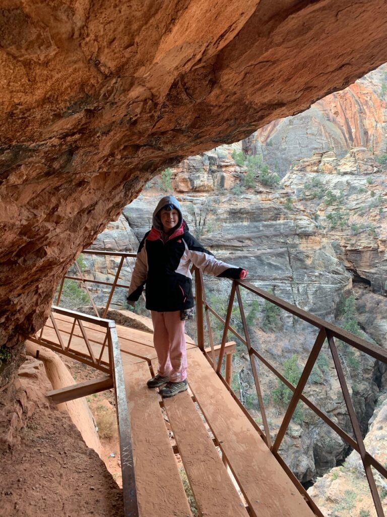 Cameron on the boardwalk hiking the Canyon Overlook Trail in Zion National Park.