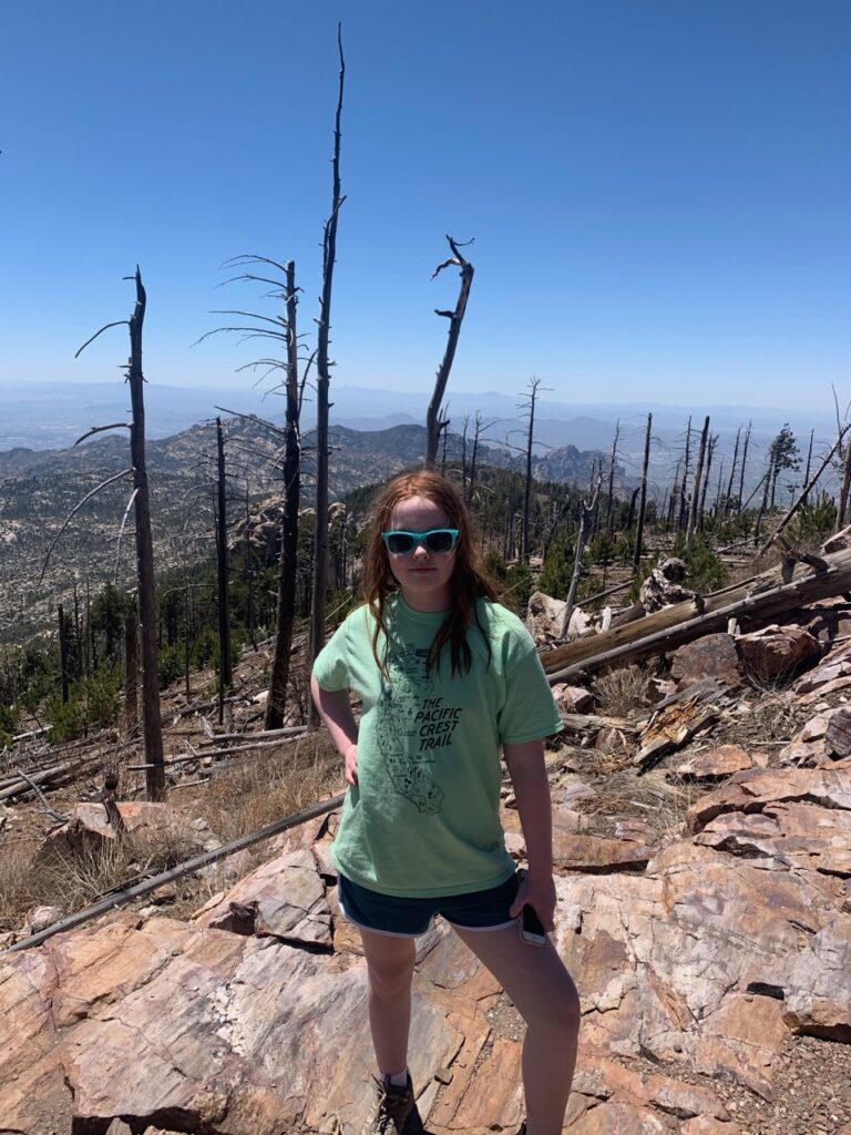 Cameron standing on a hiking trial on Mount Lemmon, near the highest point in the Santa Catalina Mountains.