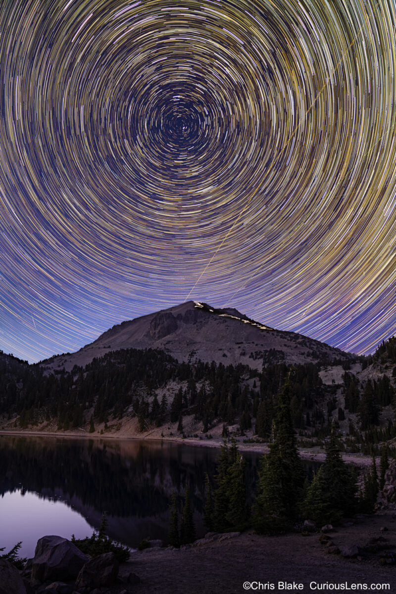 Nighttime view at Lake Helen with Lassen Peak aligned with the North Star. A meteor shower added a touch of magic to this star-filled scene, highlighting the beauty of this high-altitude location at 9,000 feet.