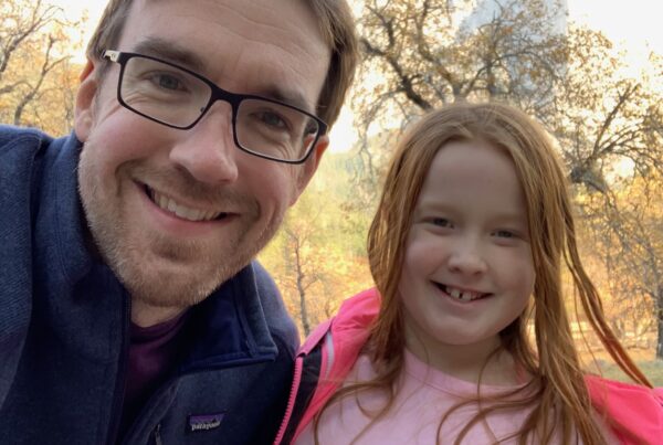 Cameron and Chris standing in Yosemite Valley in the middle of fall.