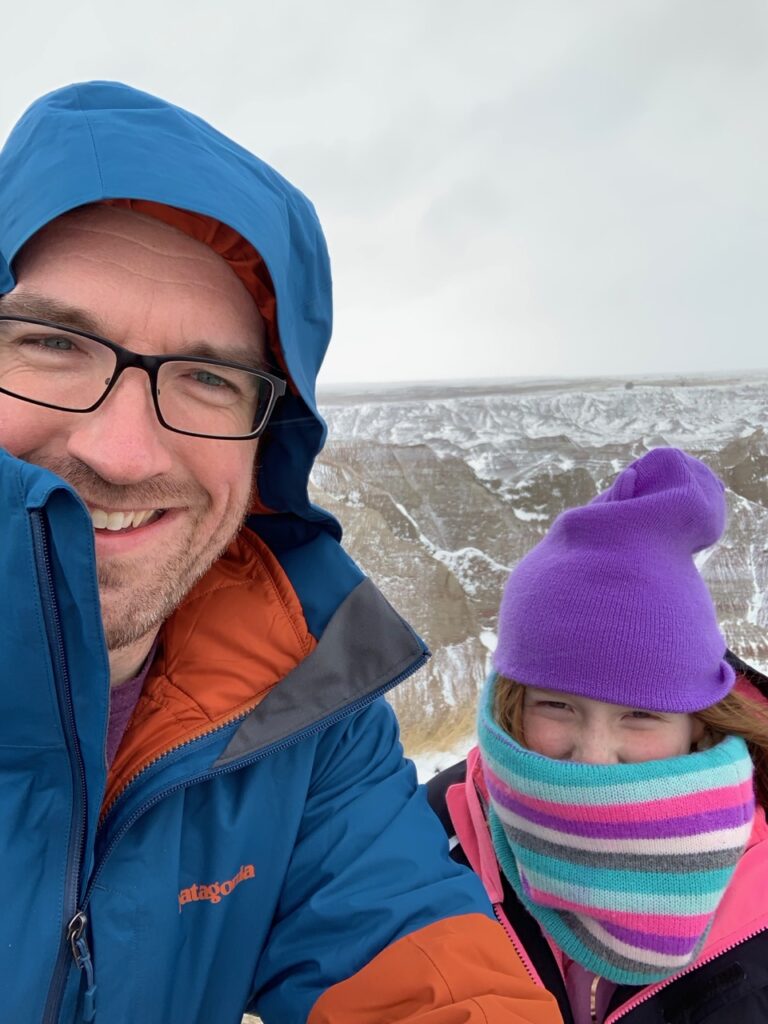 Cameron and myself standing outside in the bitter cold just after sunrise in Badlands National Park.