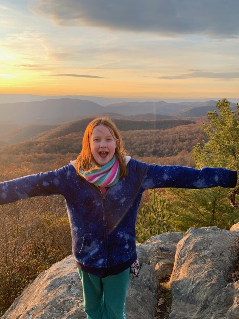 Cameron at sunset on the summit of Stony Man Mountain.