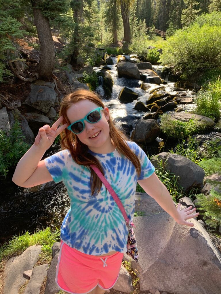 Cameron after hiking down to Kings Creek to check out the waterfalls in Lassen Volcanic National Park. On a bright sunny summers day.