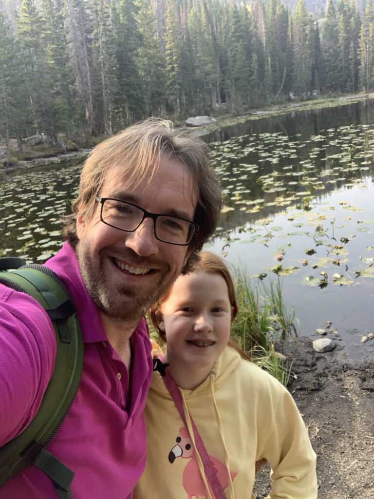 Cameron and myself on the shores of Nymph Lake on the Bear Lake Trail.