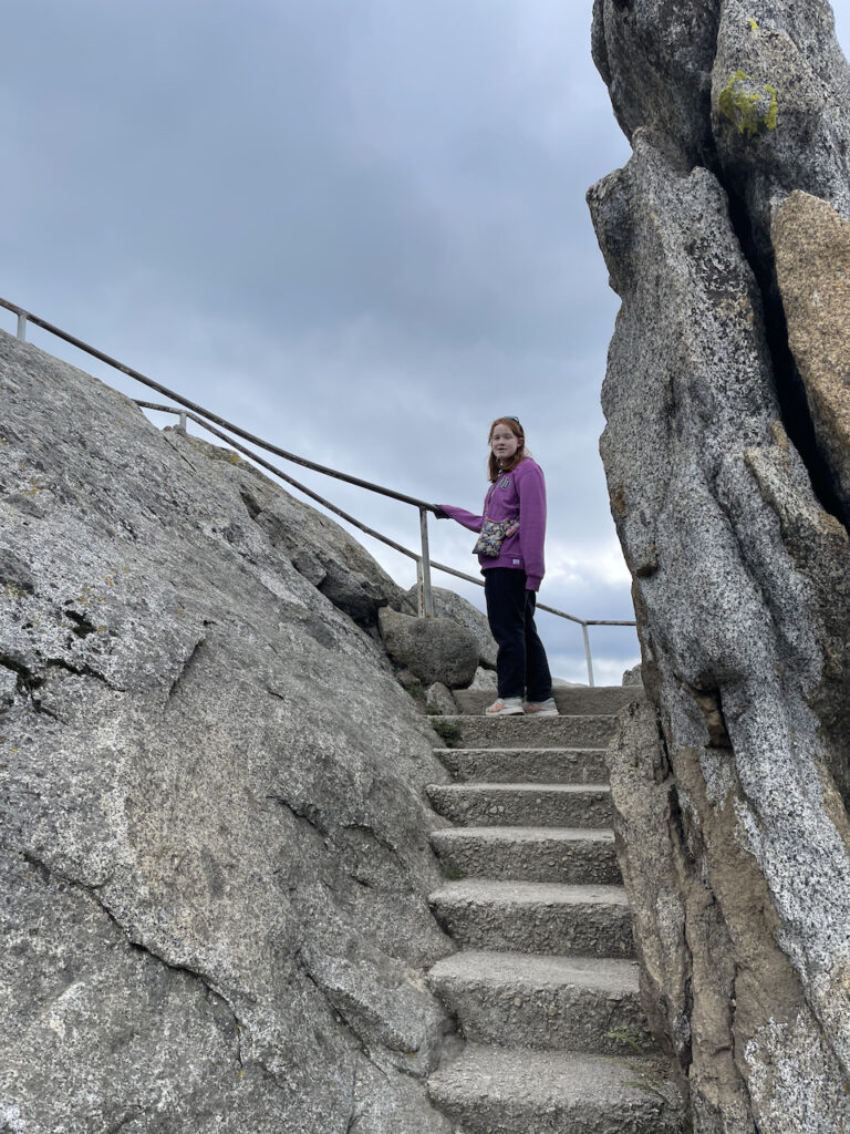 Cameron looking down at me mid-way up the steps to Moro Rock. The sky was filled with storm cloud above. 