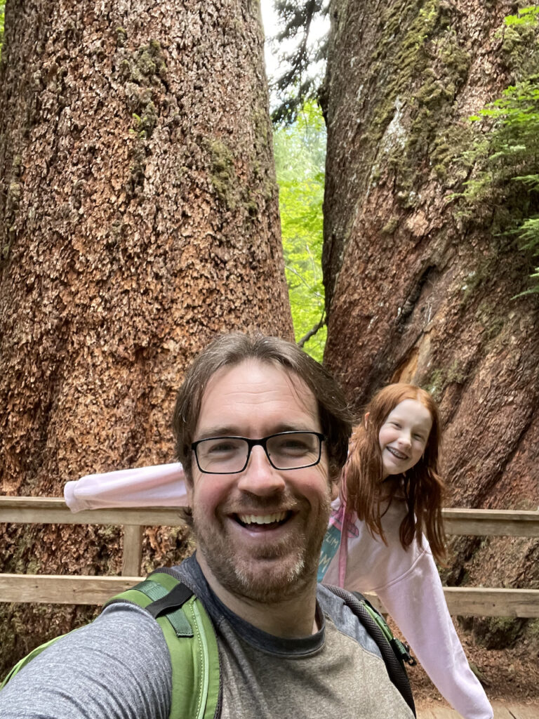 Cameron and myself all smiles as we are in the Grove of the Patriarchs with two massive trees behind us. 