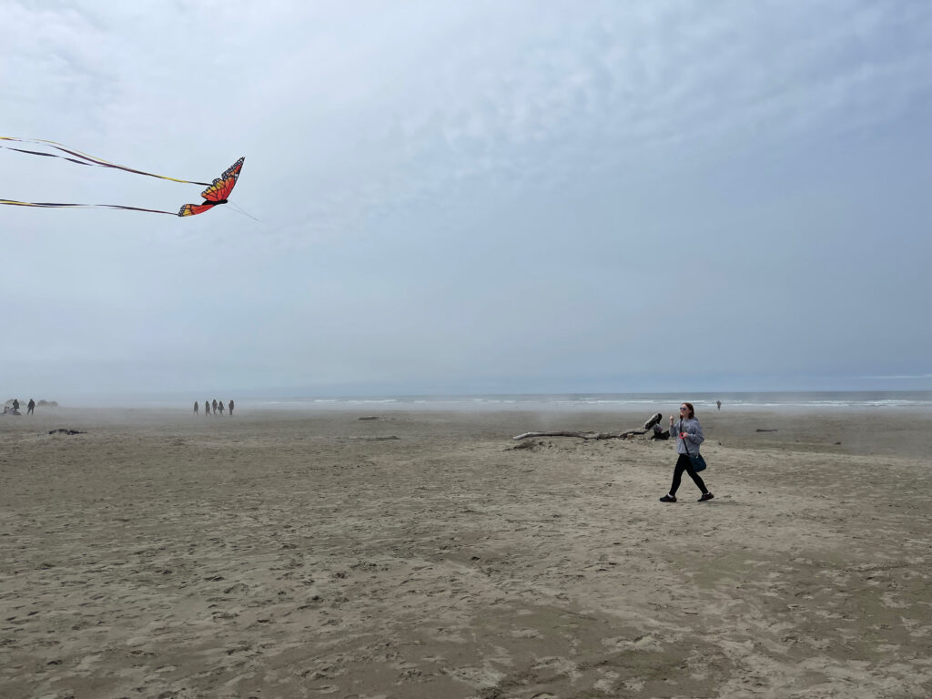 Cameron flying her new Kite at Agate Beach - its so foggy you can hardly see the nearby ocean. 