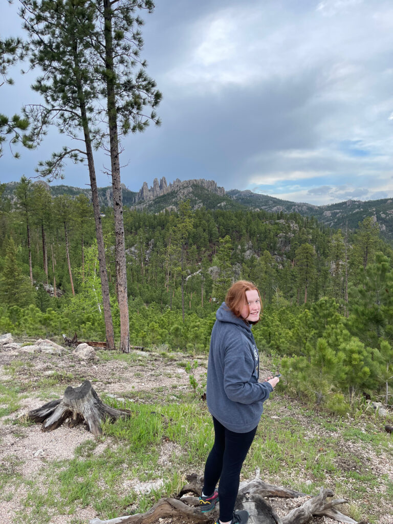 Cameron looking at out from an amazing viewpoint in Custer State Park.