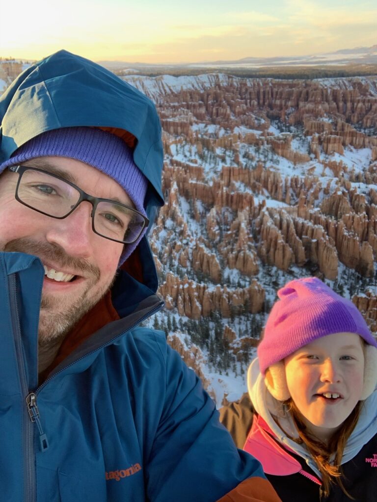 Cameron and myself standing in the freezing cold at Bryce Point - in Bryce Canyon National Park.