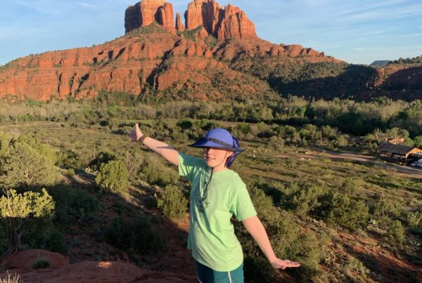 Cameron posing at sunset on the Secret Slickrock Trail in Sedona AZ.