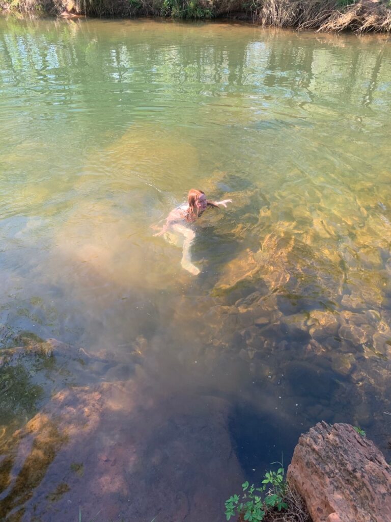 Camera swimming in Oak Creek in Sedona AZ.