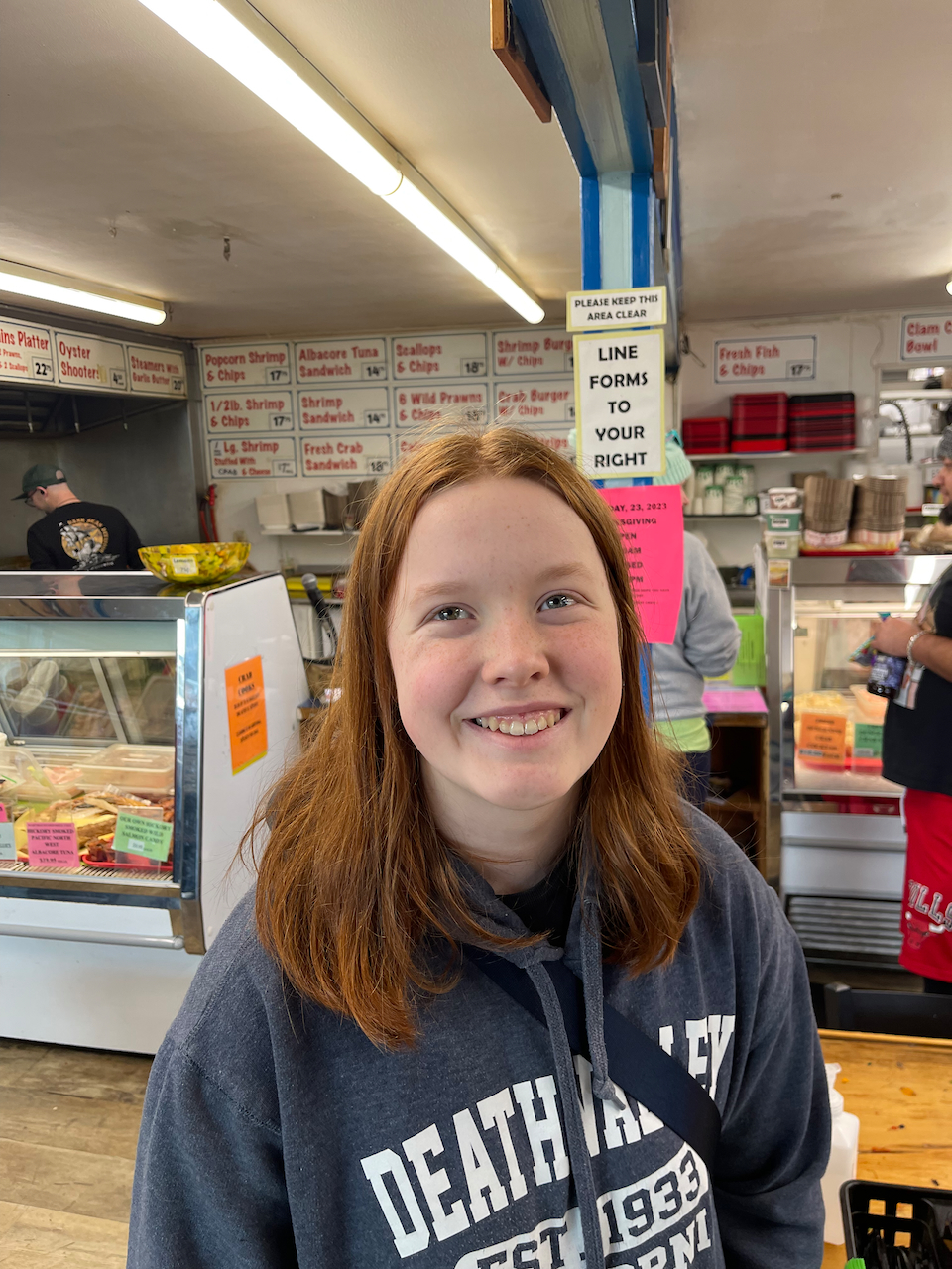 Cameron standing in the South Beach Fish Market near Newport OR. 