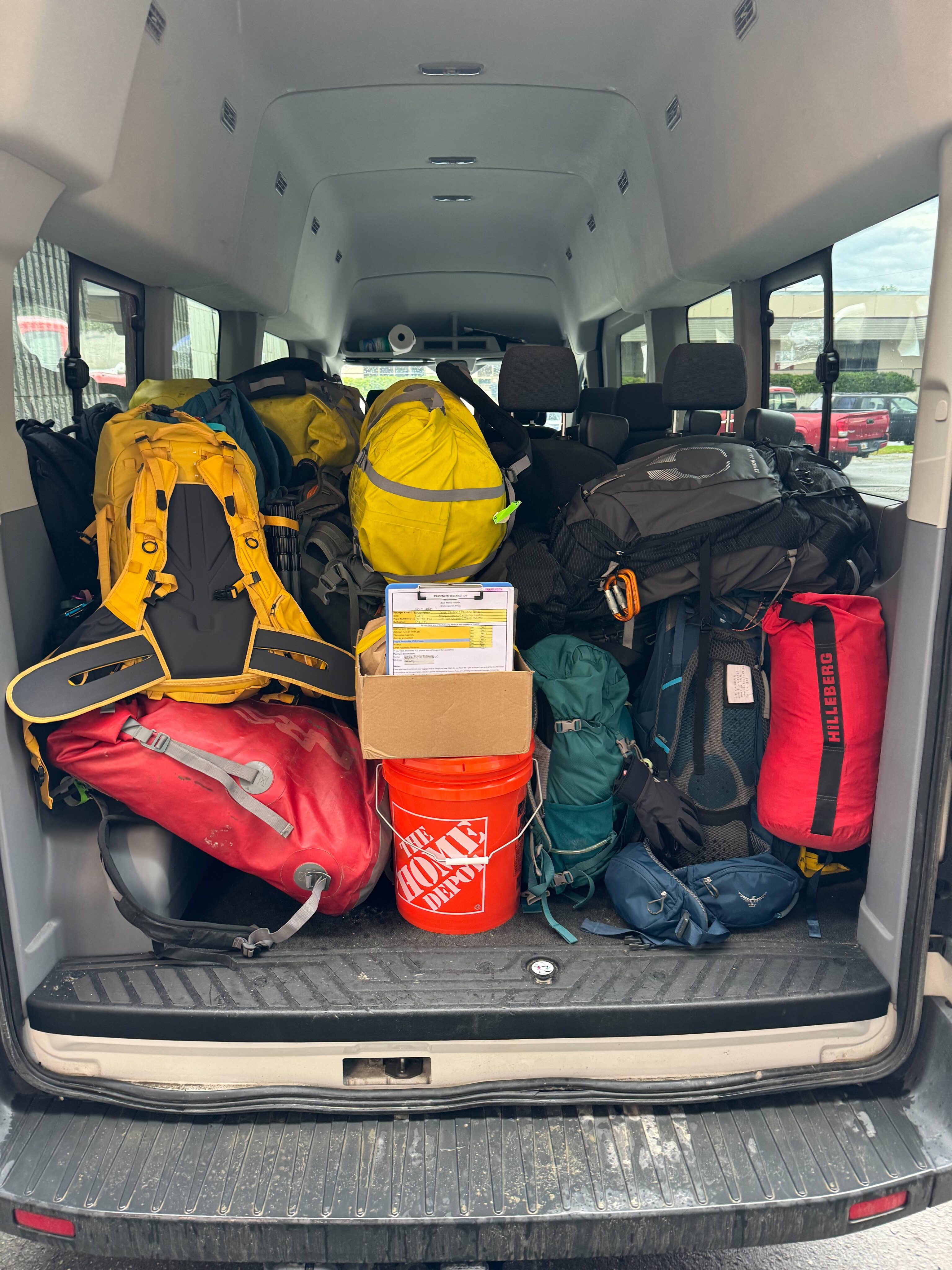 The big van from Alaska Alpine Adventure loaded top to bottom with all our camping gear for the backcountry trip.