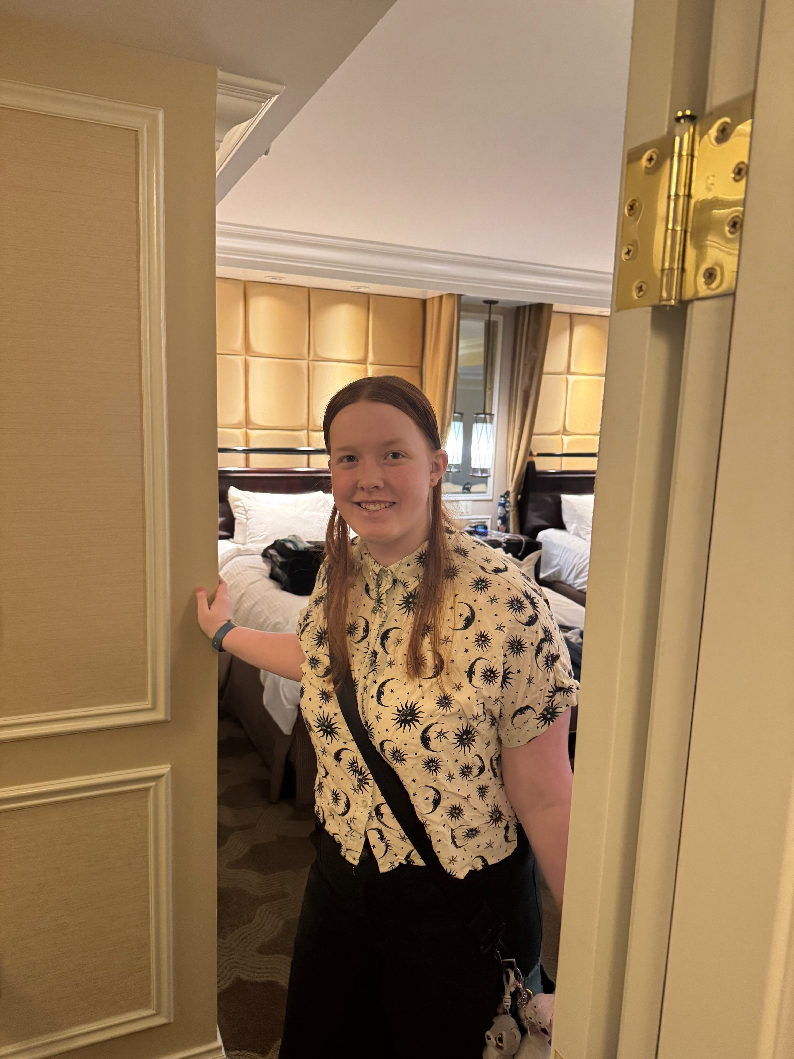 Cameron all dressed up standing in the doorway to her hotel room in Las Vegas. 