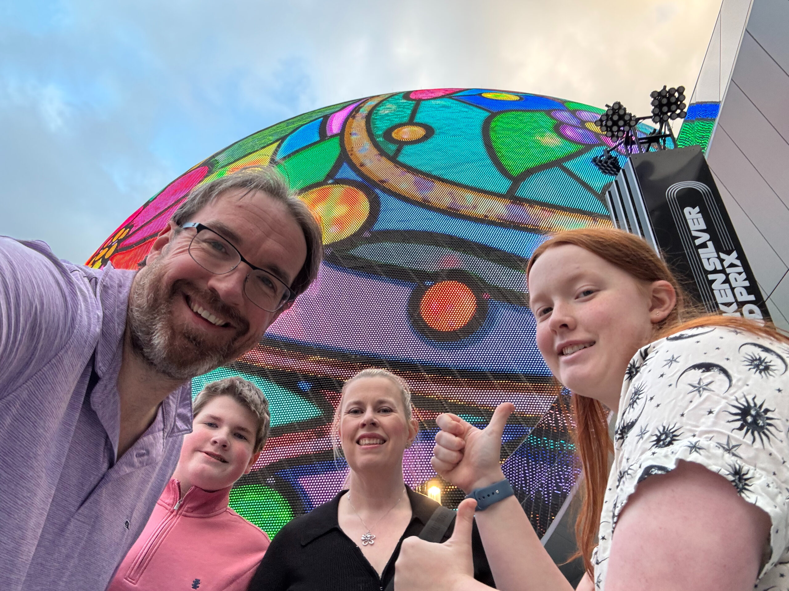 The family, Chris, Cat, Cameron and Collin standing in front of The Sphere in Las Vegas.