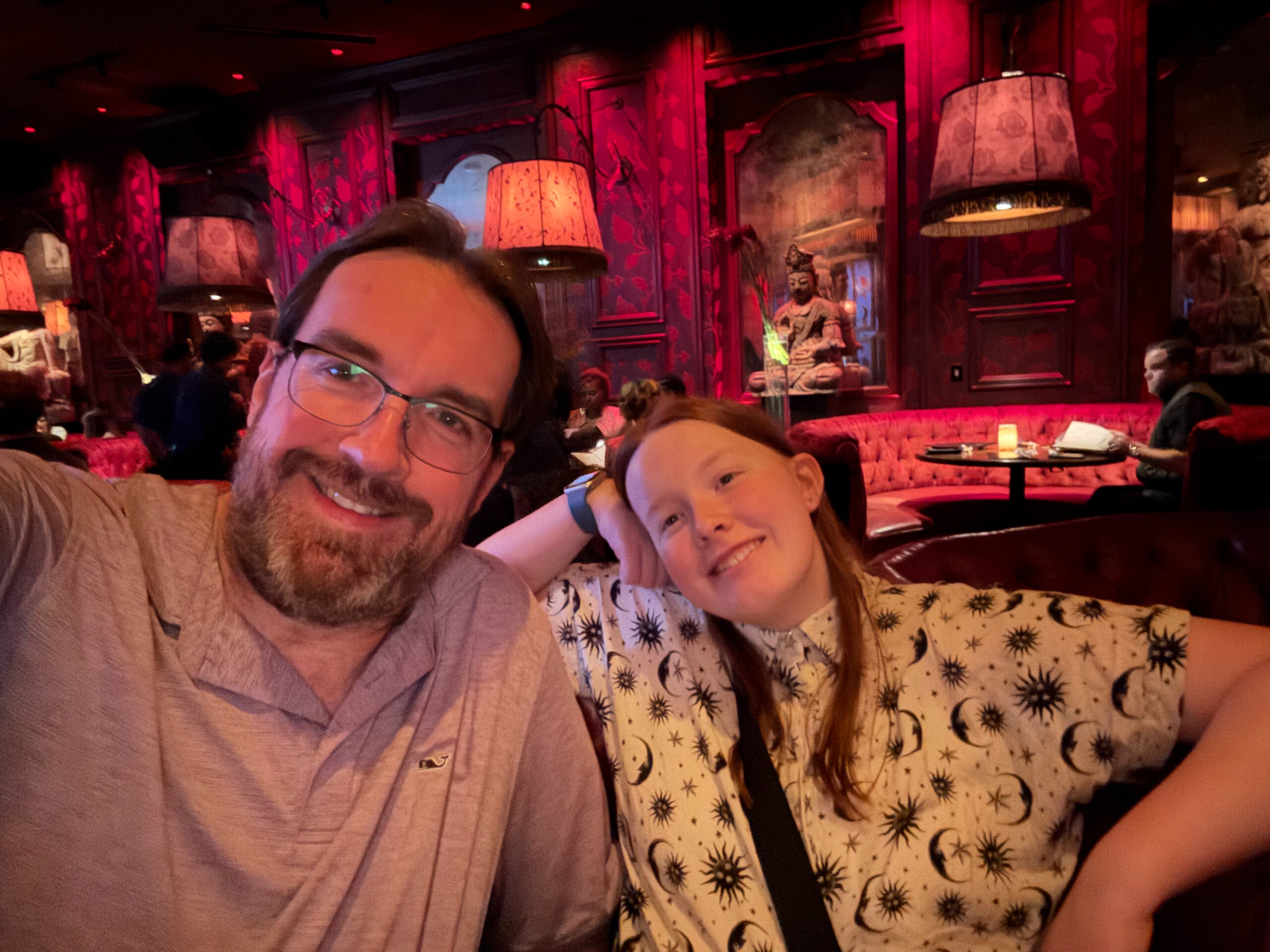 Chris and Cameron pose for a photo at the table at Tao in Las Vegas.