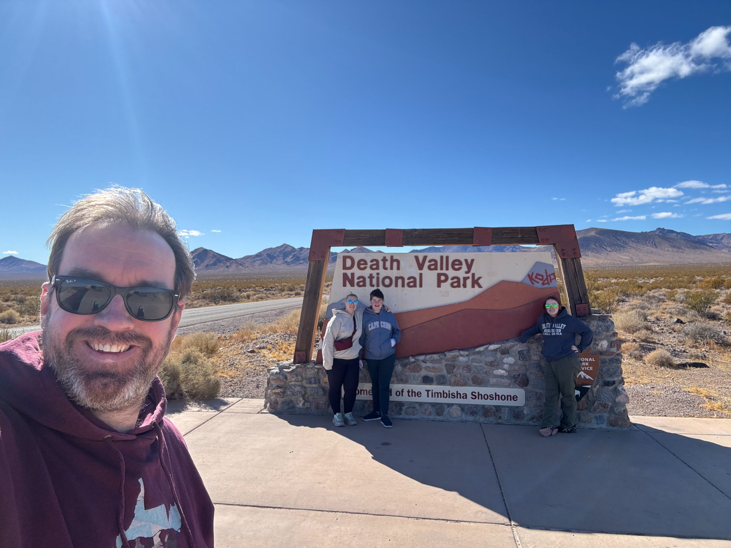 Chris, Cameron, Cat and Collin in front of the Death Valley National Park sign. 