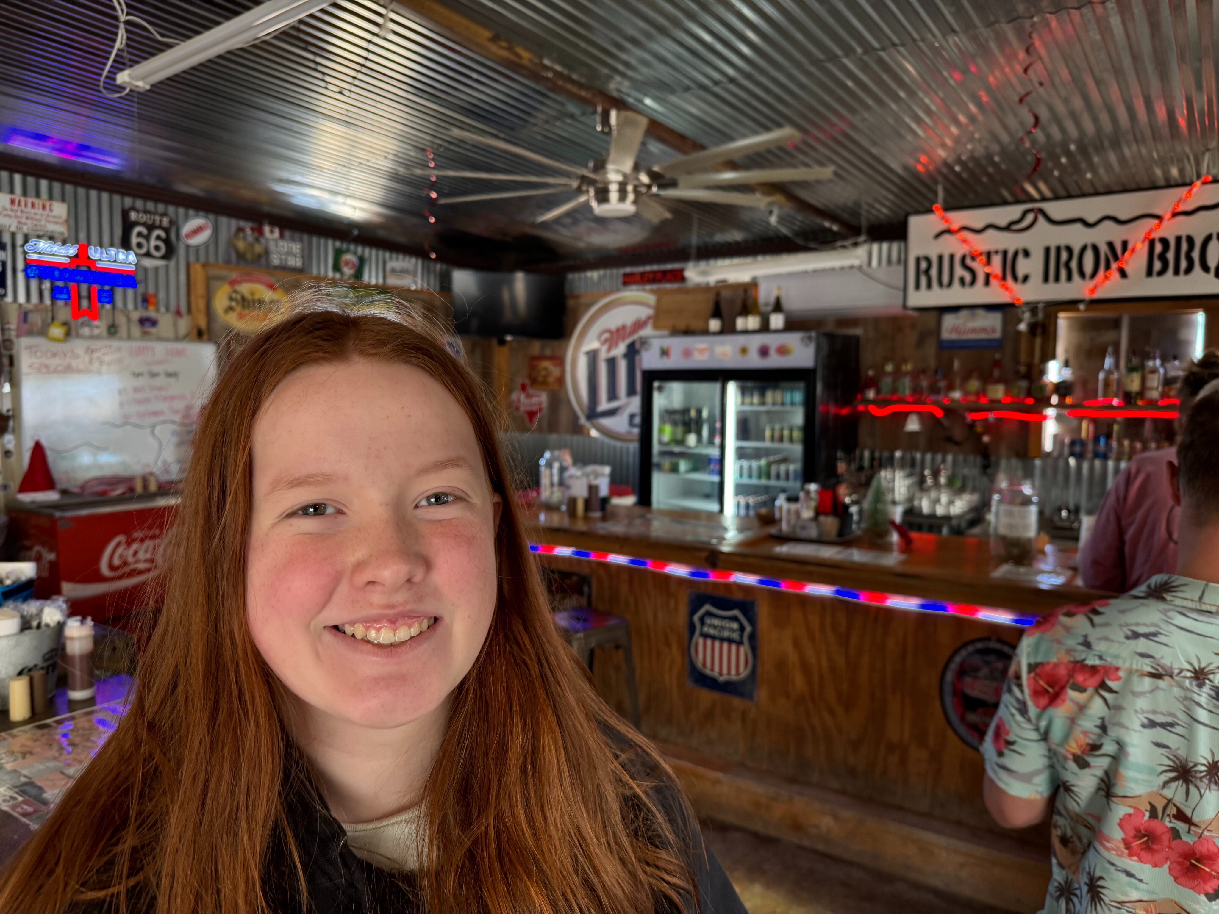 Cameron waiting to order food at the DB's Rustic Iron BBW.