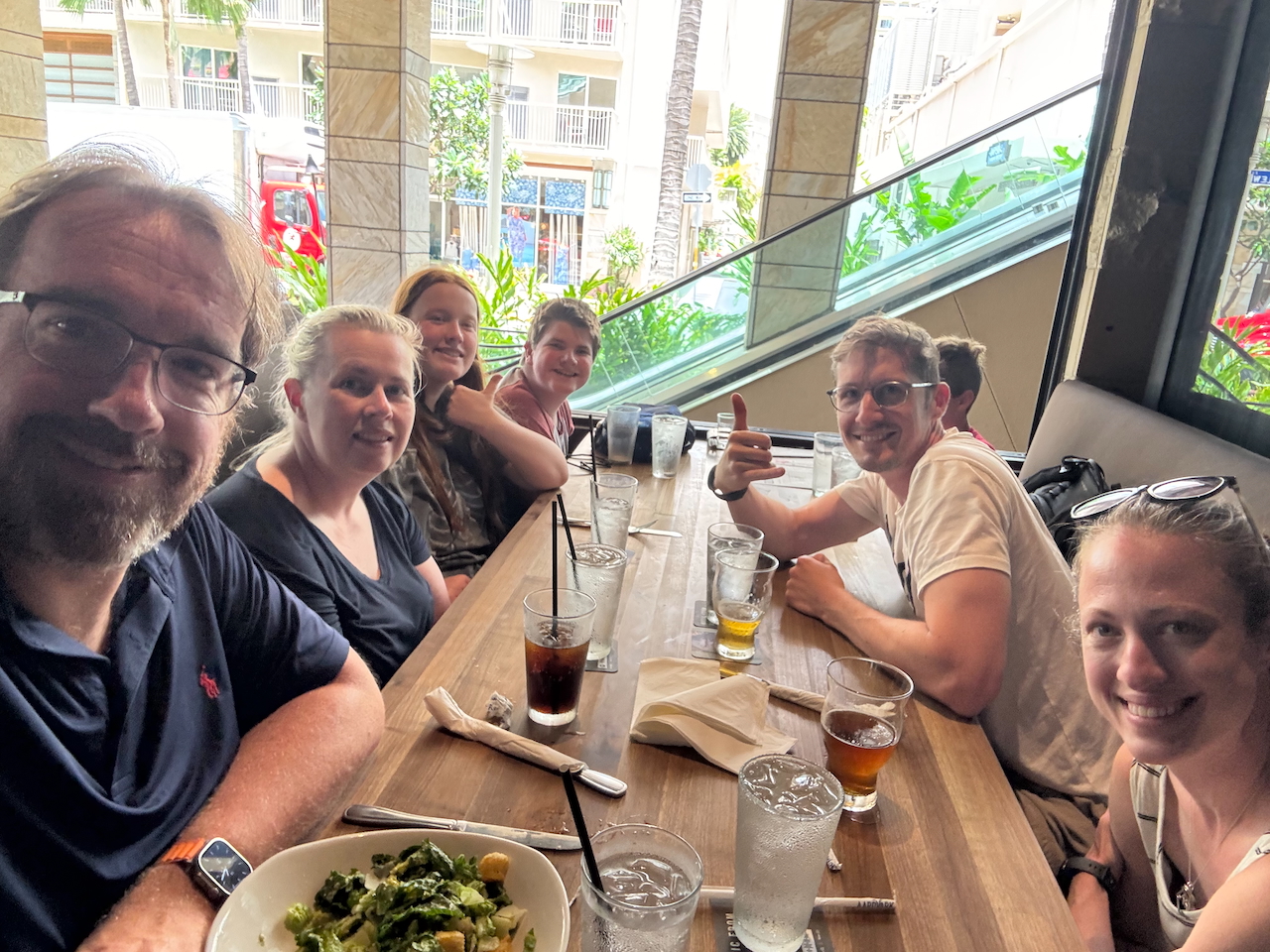 Family eating lunch together in Waikīkī.