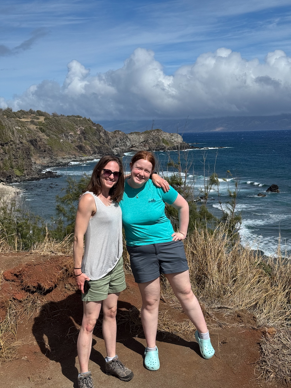 Veronica and Cameron on Maui cliffs.