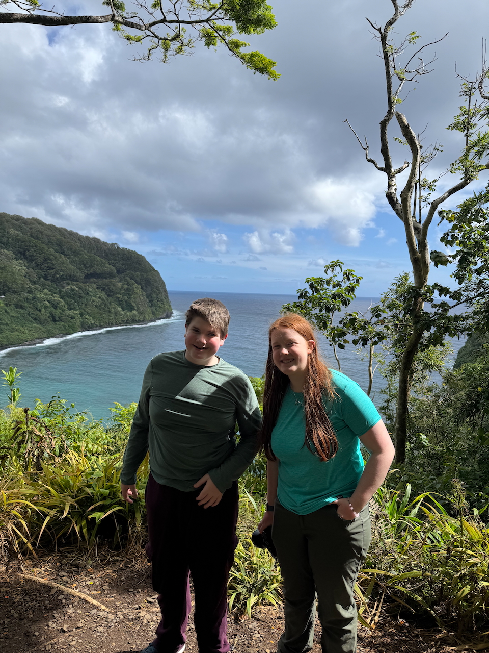 Cameron and Collin standing on an overlook on the Road to Hana