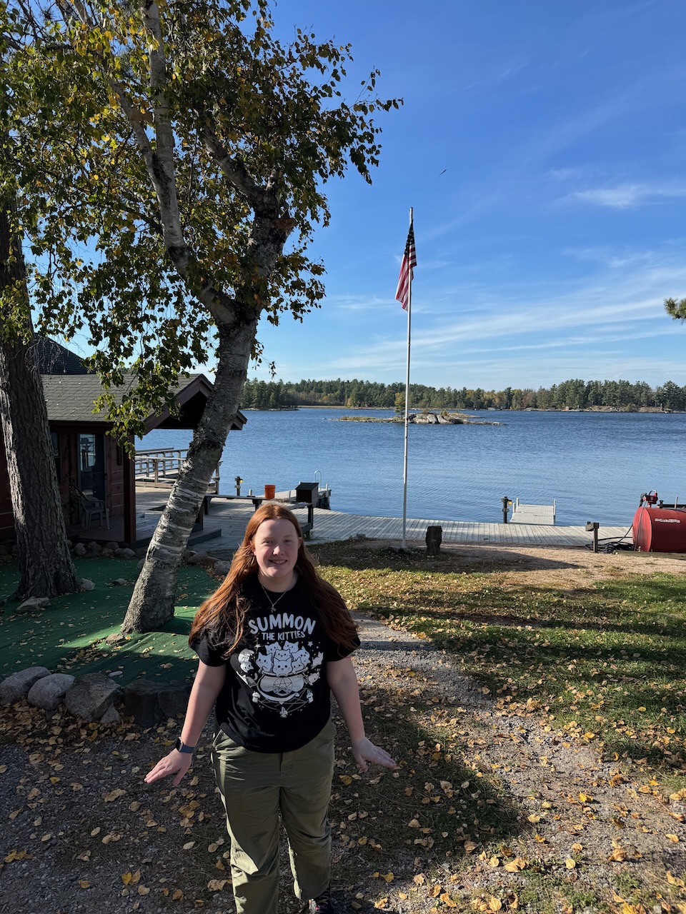 Cameron standing outside the main office of Northern Lights Resort on Lake Kabetogama, Minnesota.