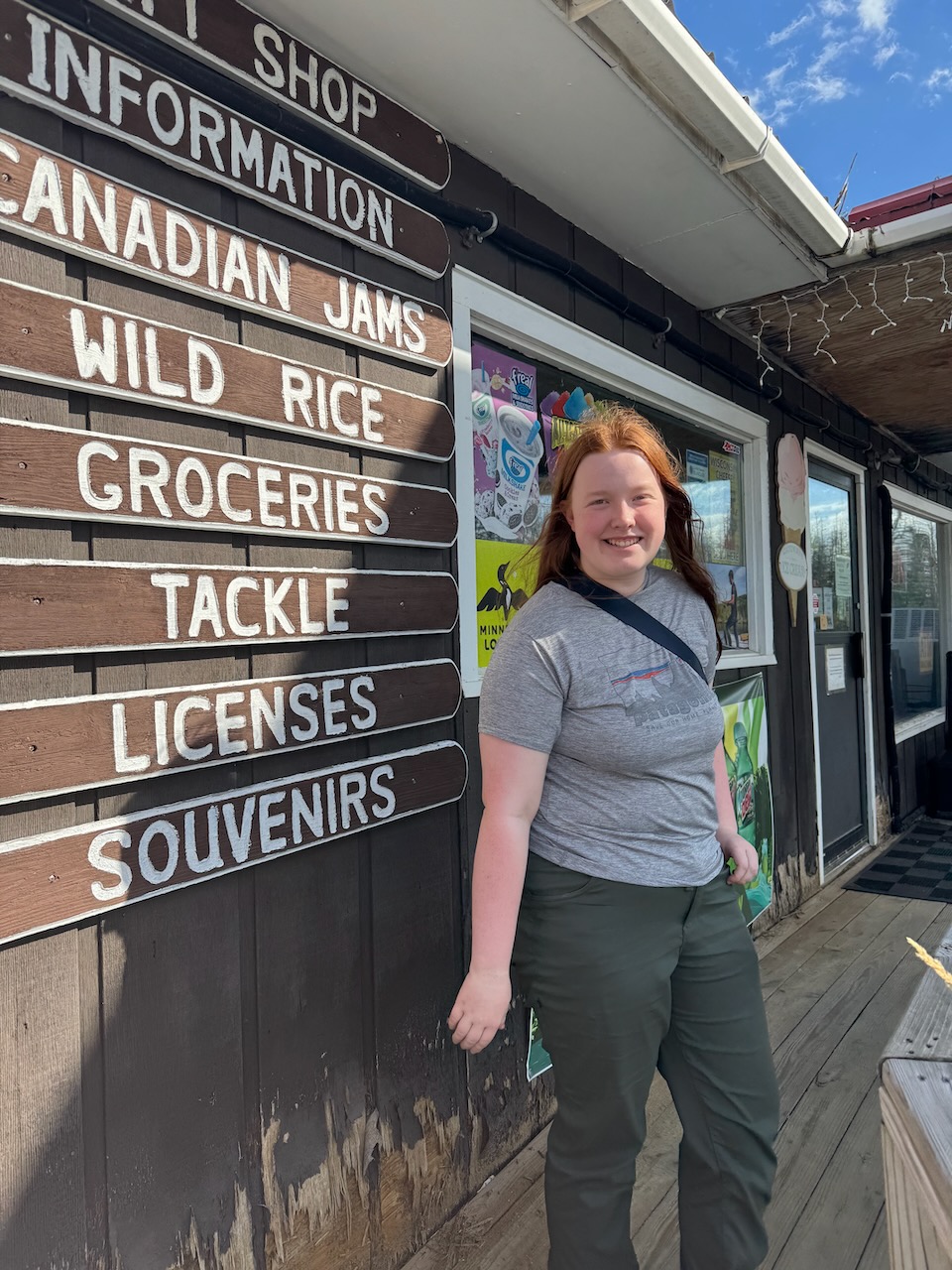 Cameron standing outside a small northern Minnesota general store near Voyageurs National Park.