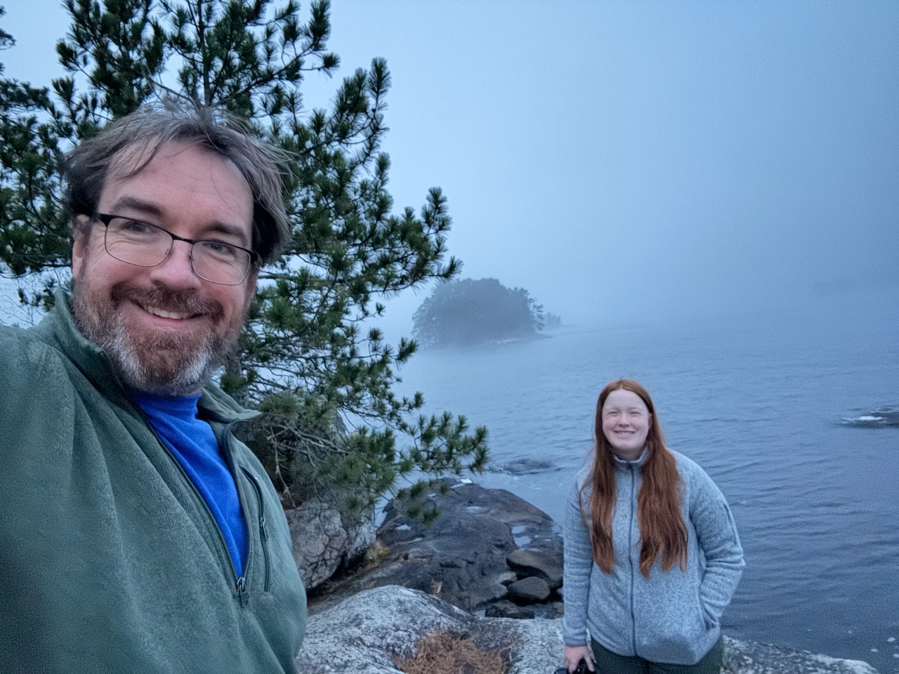Chris and Cameron at Ash River surrounded by thick morning fog after an overnight storm.