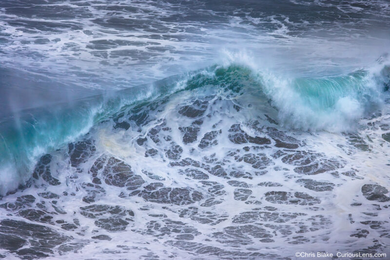 Large coastal waves rolling in near Heceta Head Lighthouse on the Oregon Coast