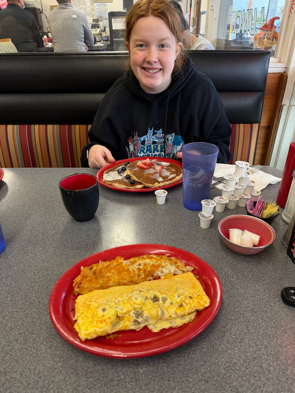 Cameron enjoying breakfast at a café near Florence, Oregon