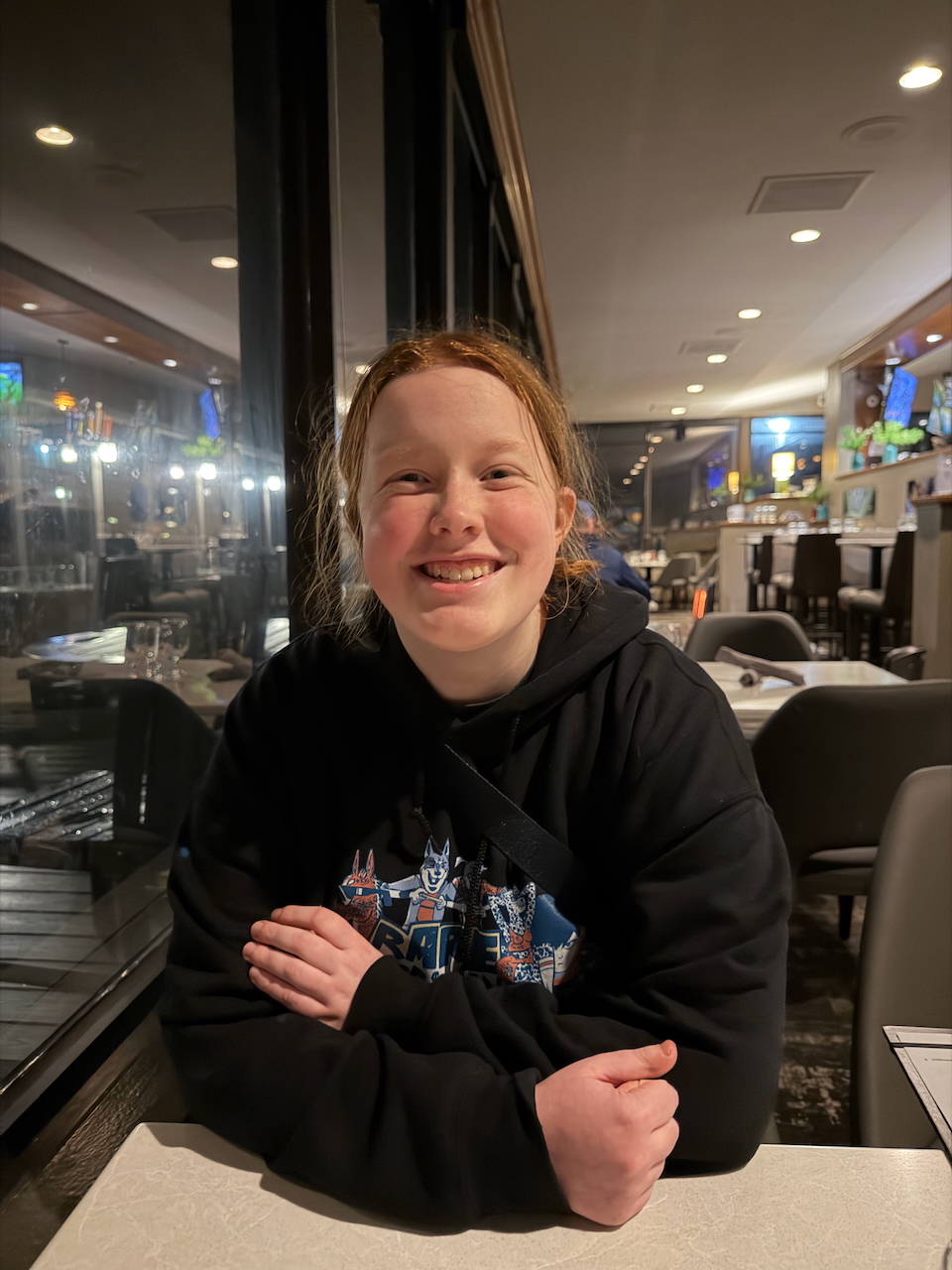 Cameron relaxing at dinner in Newport, Oregon after a day of coastal hiking and photography