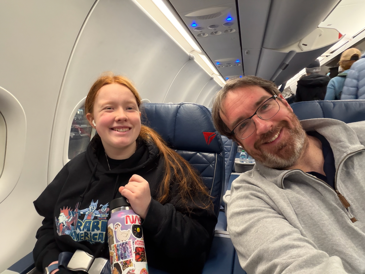 Chris and Cameron flying from Boston to Detroit.