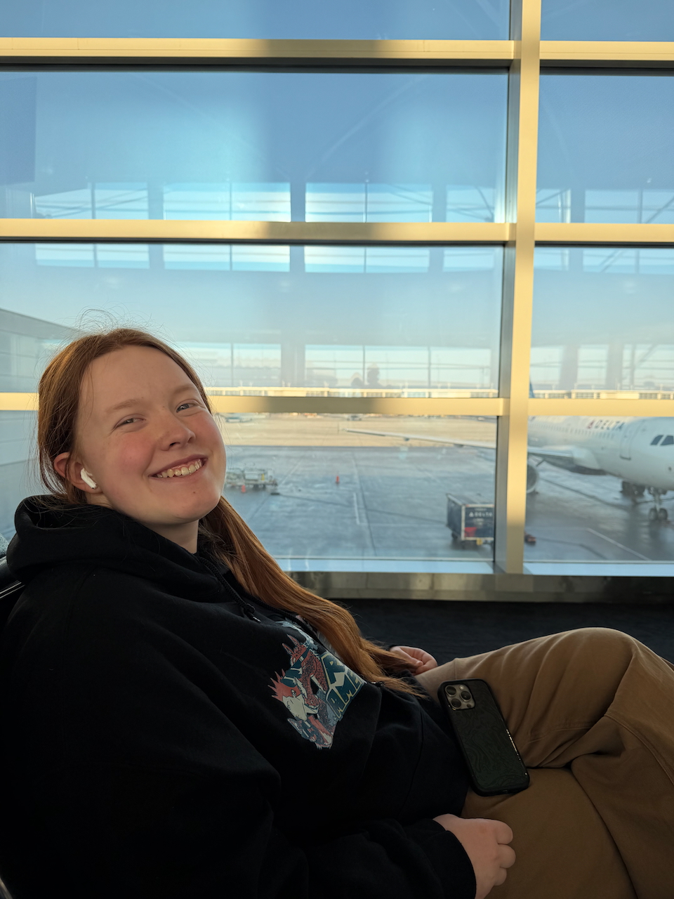 Cameron relaxing in the Delta Sky Club before the flight to Hawaii.