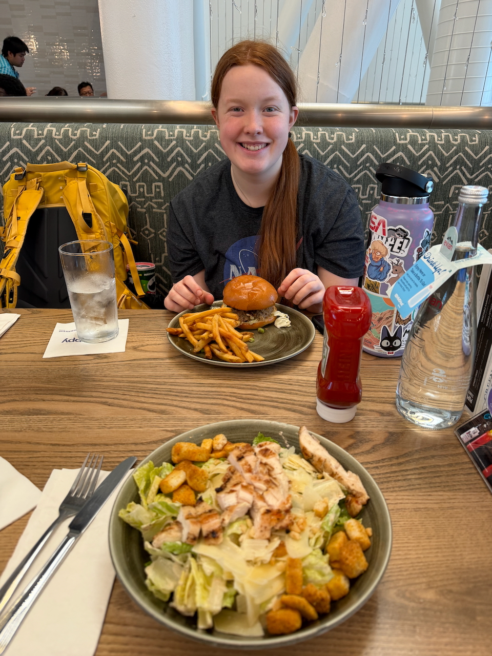 Cameron eating lunch at Honolulu Airport before the flight to American Samoa.