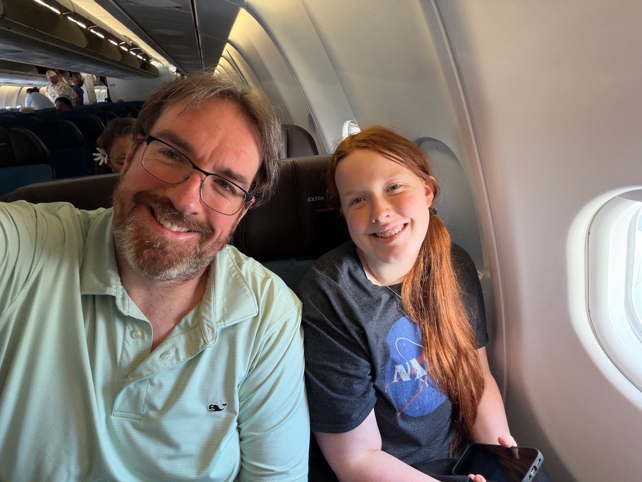 Chris and Cameron on the Hawaiian Airlines flight to American Samoa.