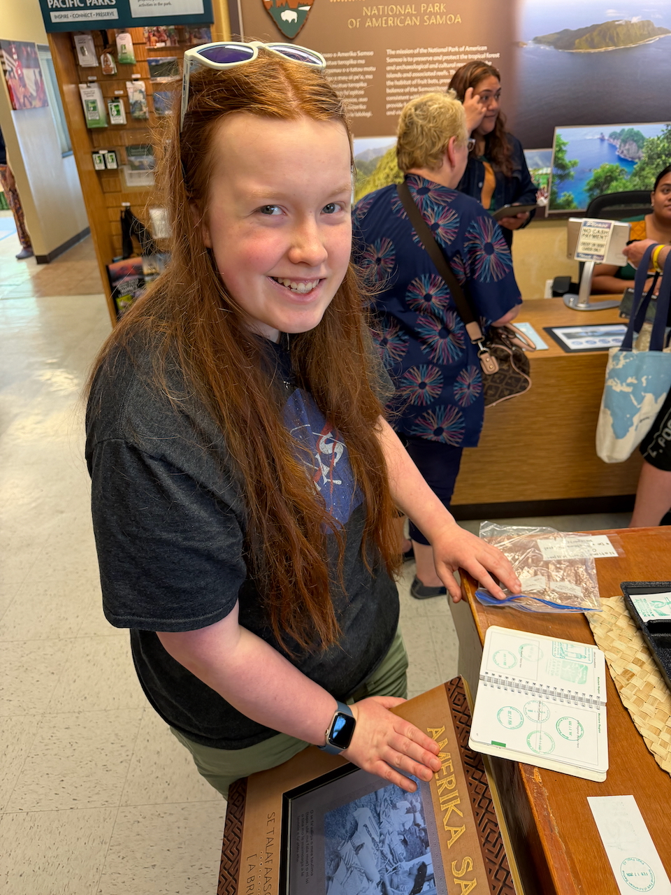 Cameron stamping her National Park passport at the visitor center.