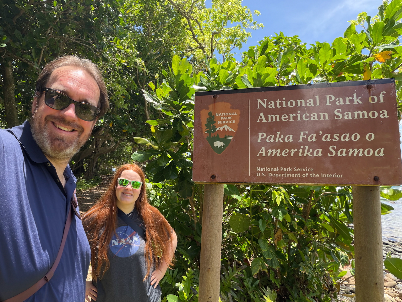 Chris and Cameron by the National Park of American Samoa sign.
