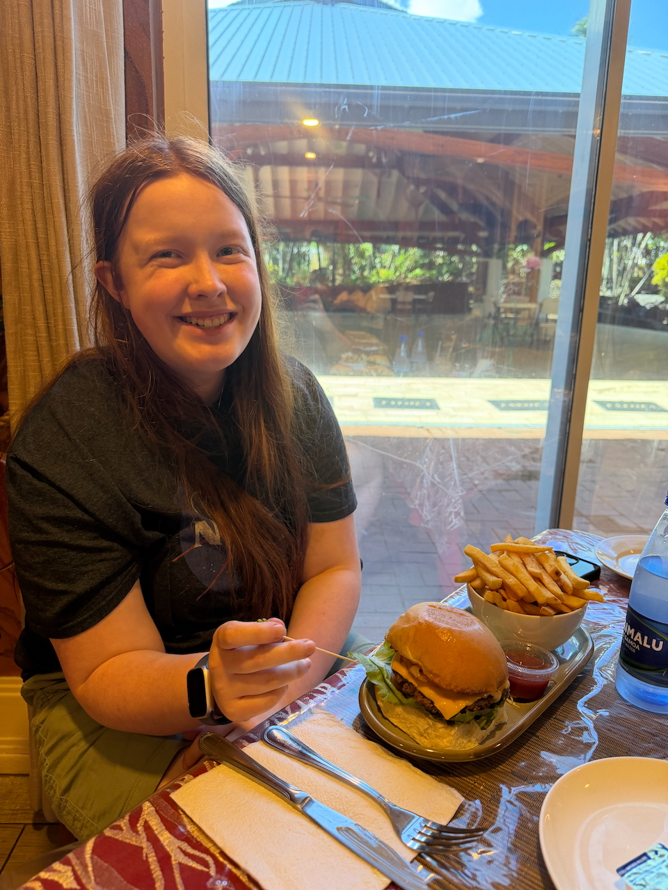 Cameron having lunch at the Trade Winds Hotel.