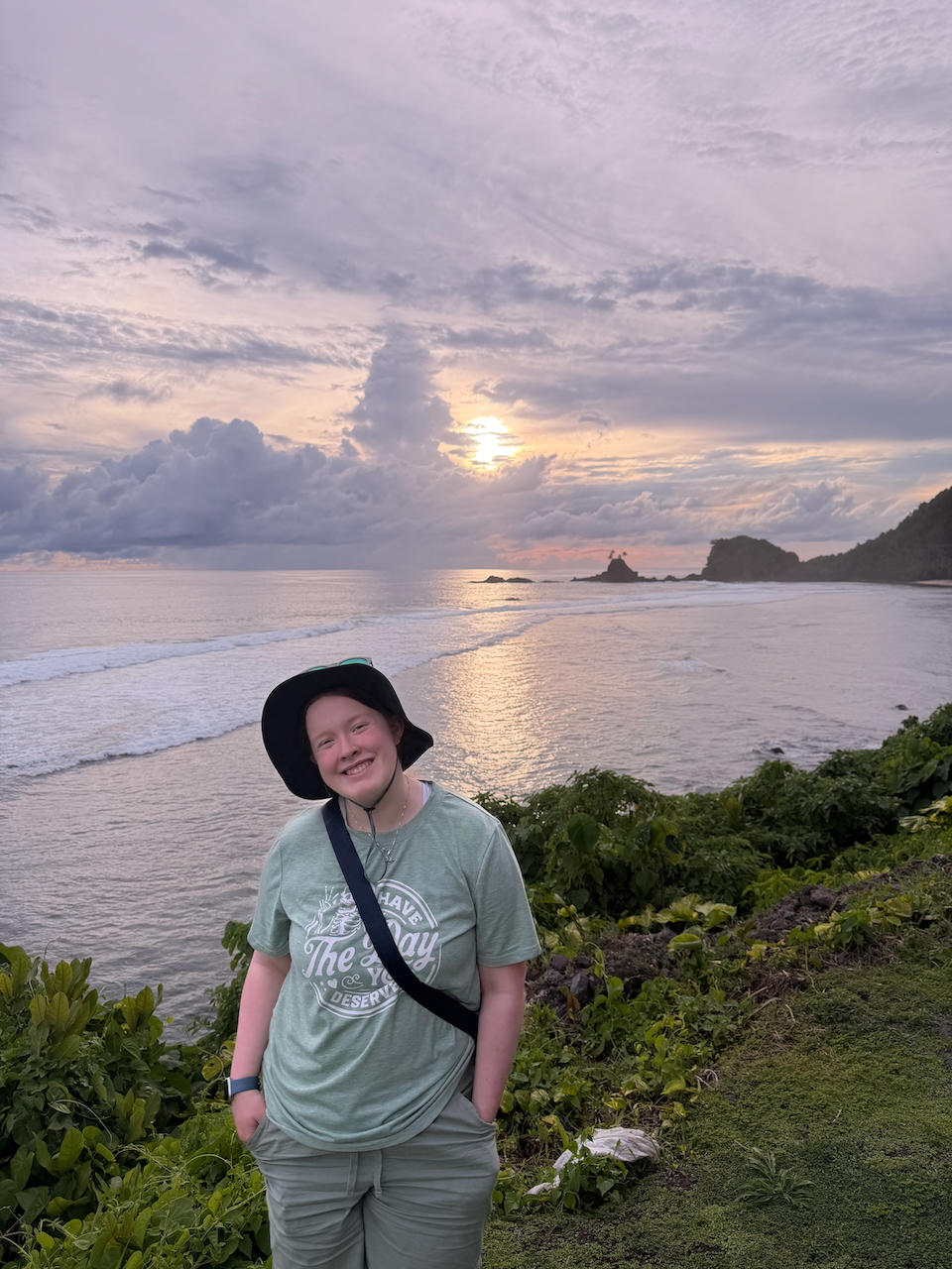 Cameron with sunset clouds over the American Samoa coast.