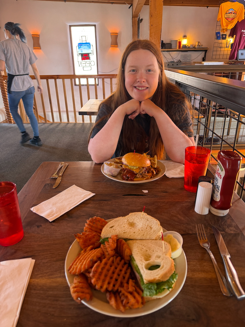 Cameron eating at a restaurant in Moab.