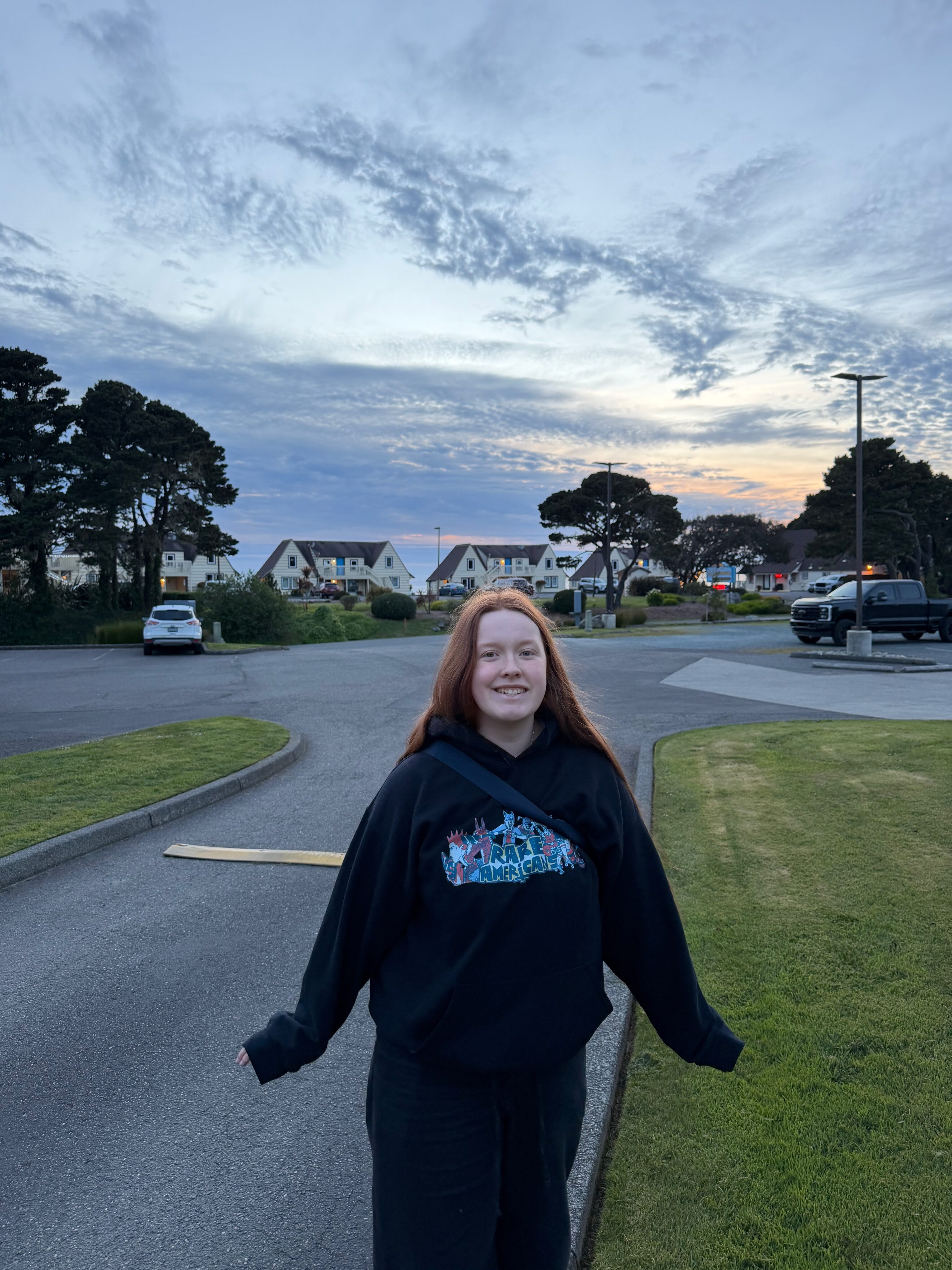 Cami standing outside our hotel in Bandon, Oregon, near the coast.
