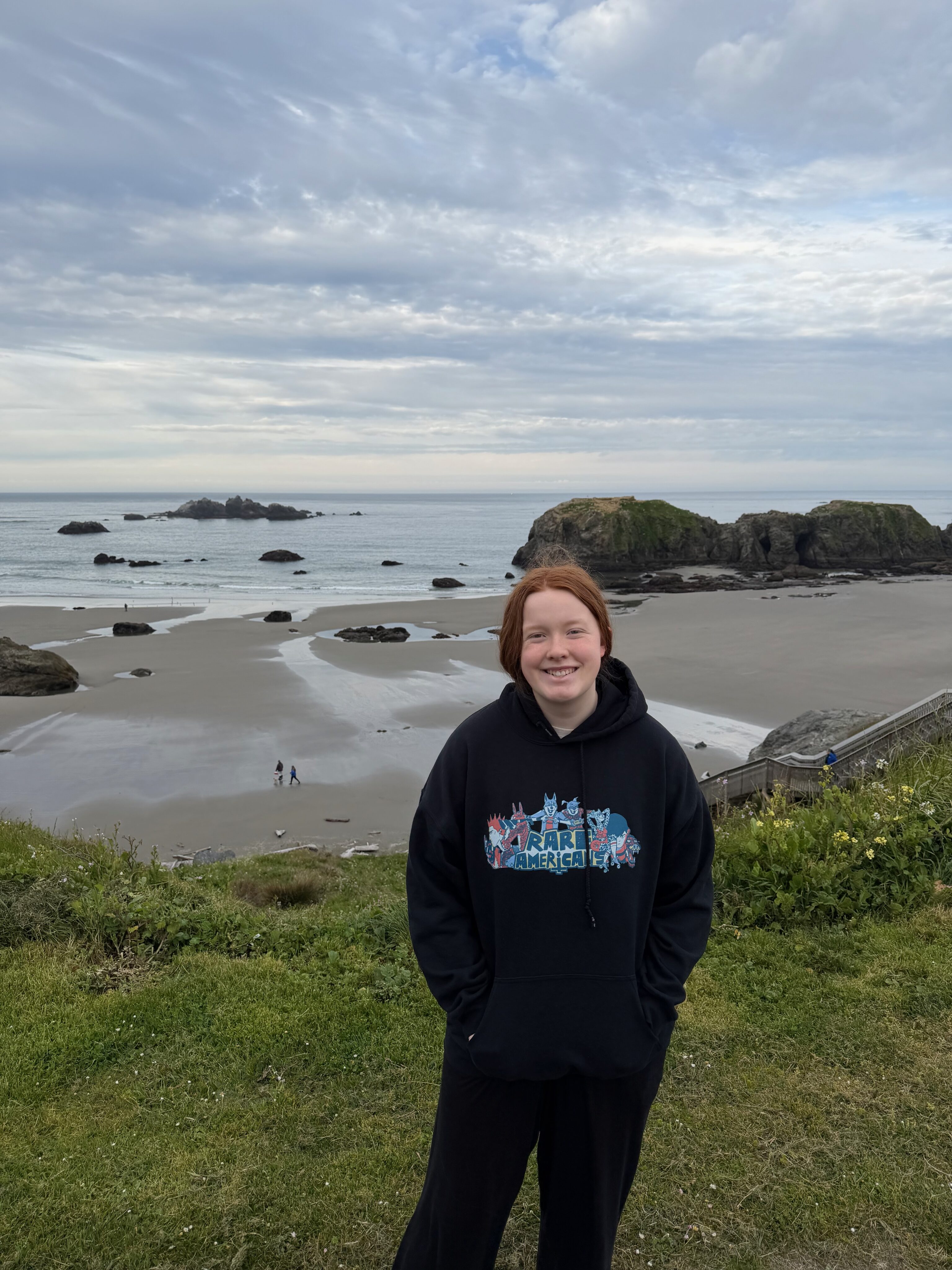 Cami overlooking Bandon Beach from the top of the dunes.