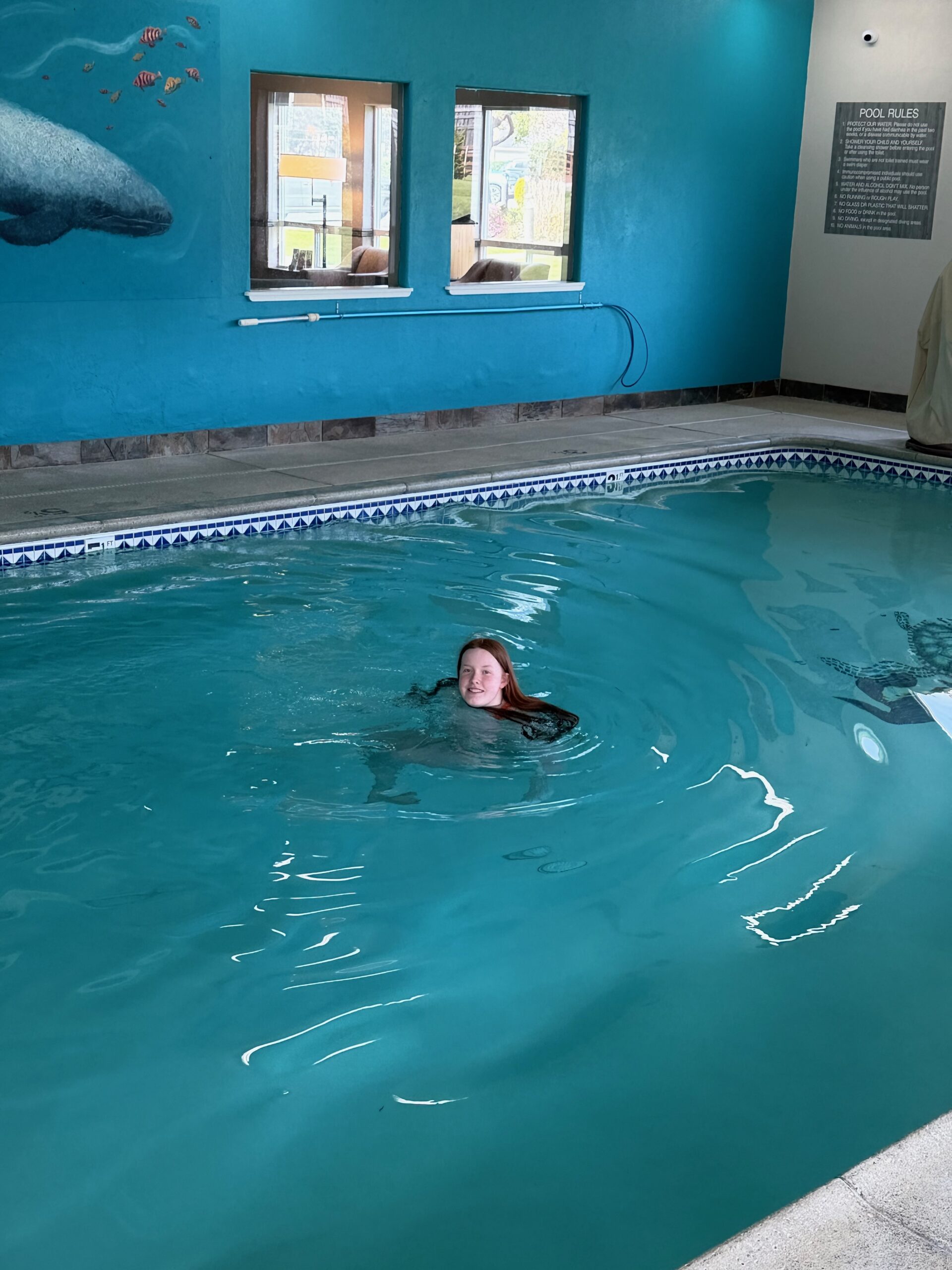 Cami swimming in the indoor pool at our hotel in Bandon, Oregon.