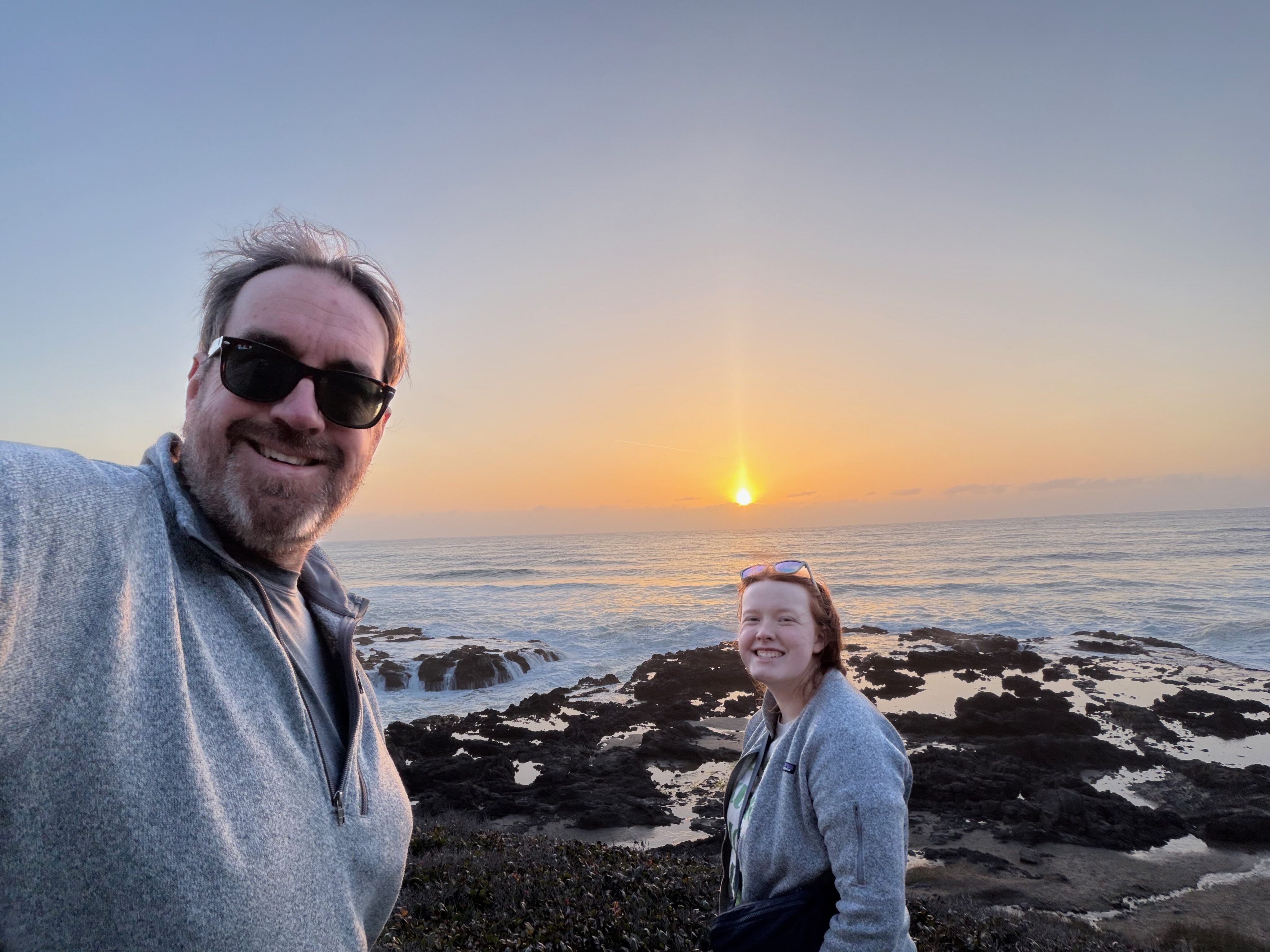 Chris and Cami taking a selfie at Thor’s Well on the Oregon Coast.